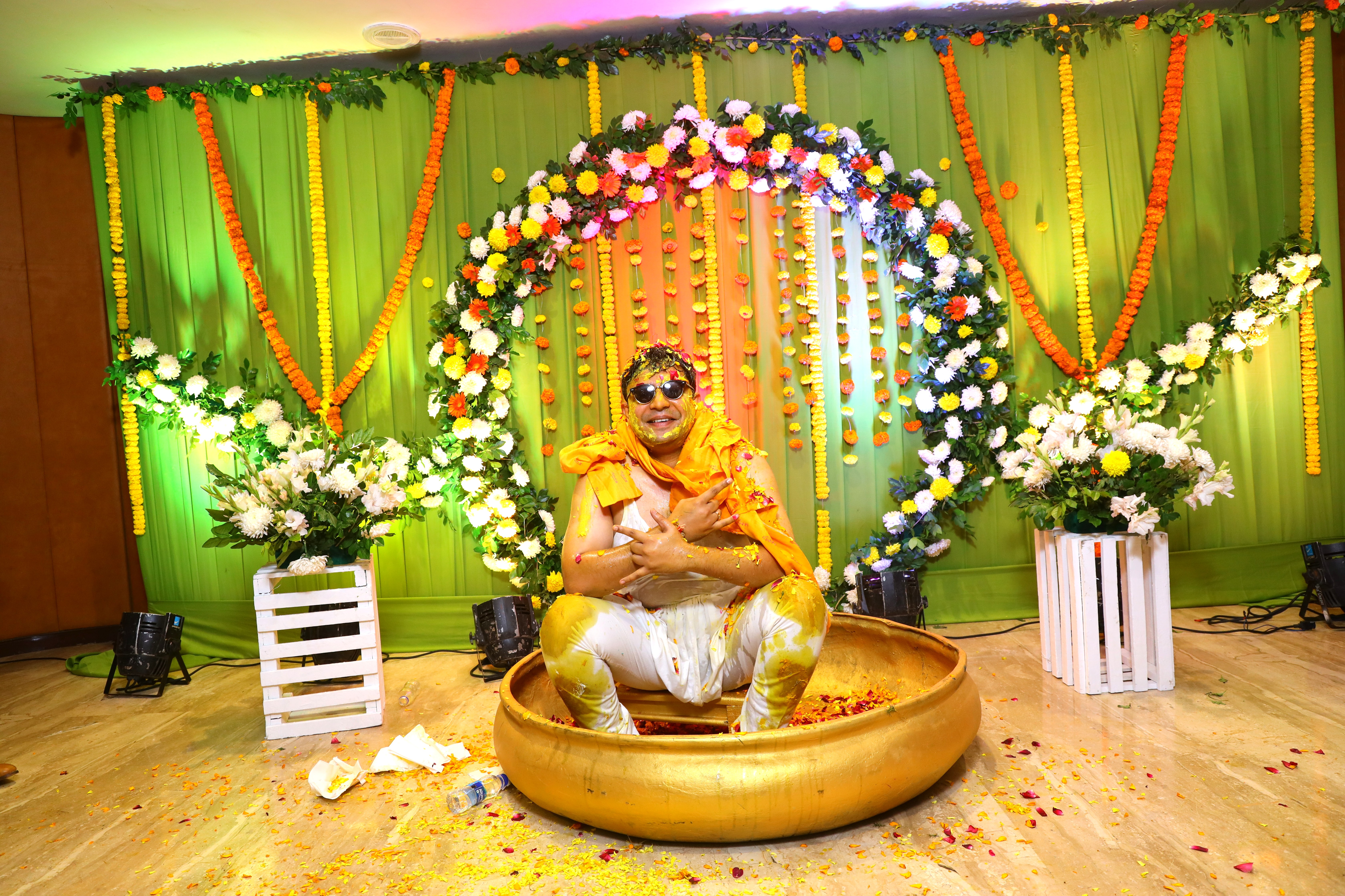 Bride enjoying joyful Haldi ceremony moments