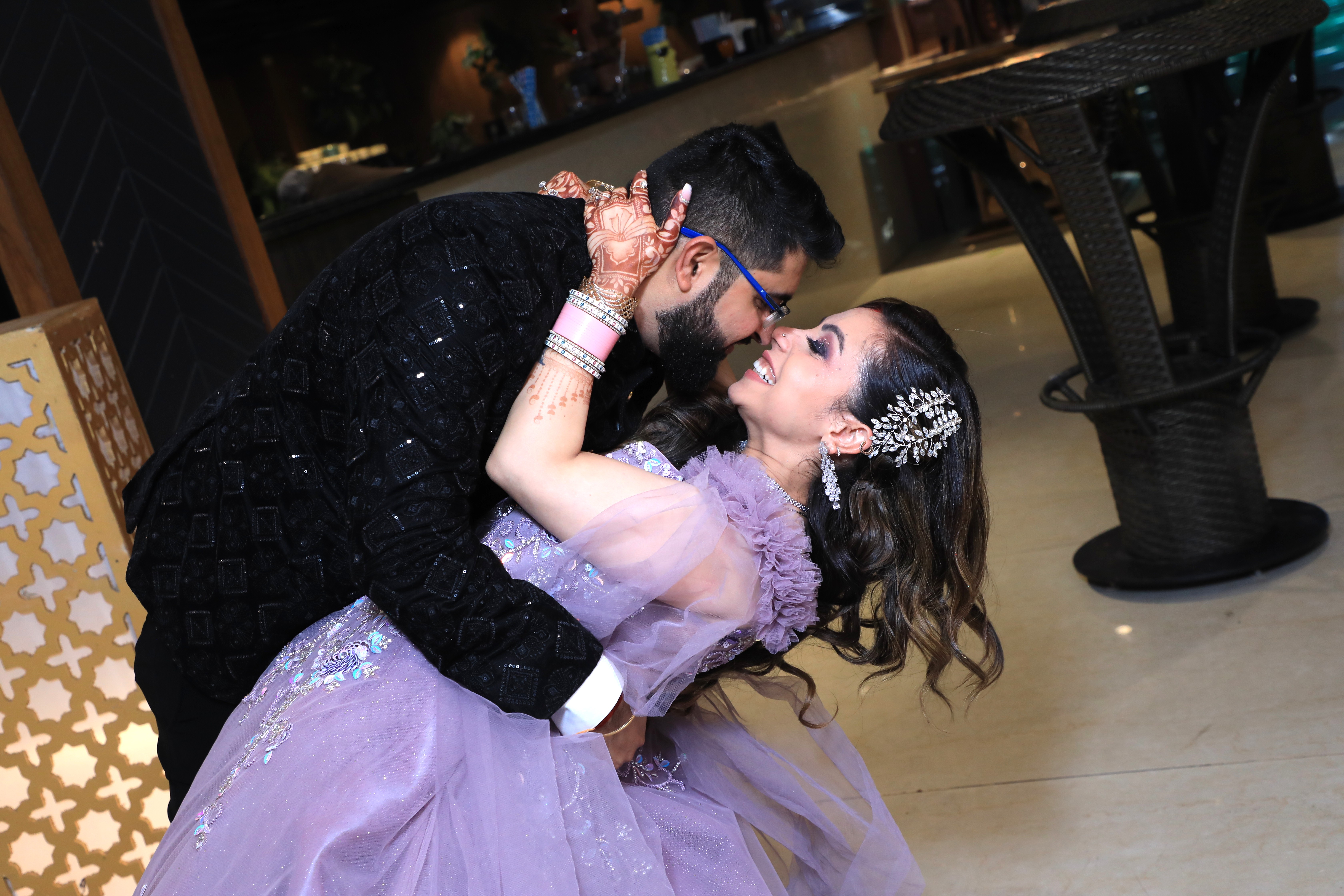 Couple celebrating during wedding cocktail function